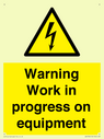 warning-work-in-progress-on-equipmentwith-electrical-hazard-symbol~